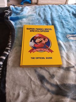 Super Mario Bros encyclopedia the official guide the first 30 years