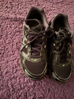 Black and silver asics