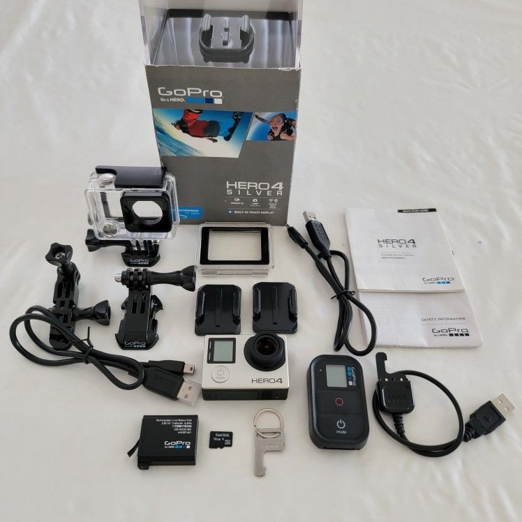 Gopro Go Pro Hero 4 Silver w/ Smart Remote & SD Card.