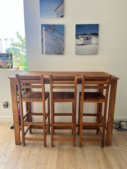 Outdoor wooden table set and 6 chairs