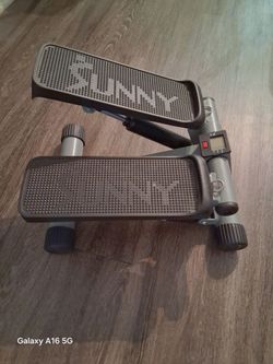 Sunny Health & Fitness Mini Stepper with an LCD fitness monitor