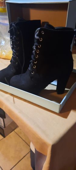 Great with Jeans...Miulamiula
High heal black above ankle shoe/boot