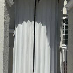 Accordion Shutter  Door  118 “ H 60  “ W