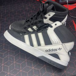 Size 8  Adidas Hardcourt Defender high-top sneakers.