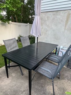 Black metal outdoor patio table