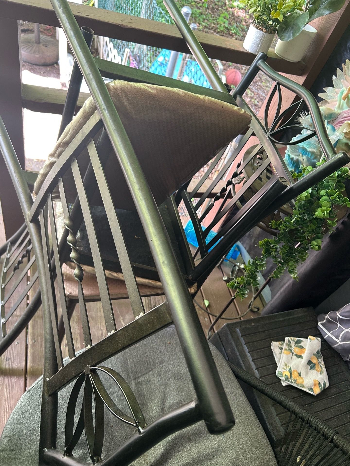 Glass table with three chairs