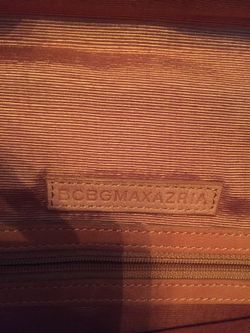 BCBG MAXAZRIA CLUTCH BAG WITH GOLD CHAIN. TAN COLOR