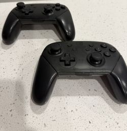 (2) Nintendo Switch Pro Controllers