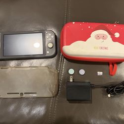 used Nintendo switch lite with 128 gb sd card and acessories