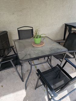 Glass table patio set