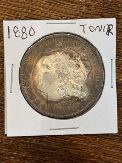 1880 Morgan Dollar Toned Silver $1 Nice Color & Eye Appeal