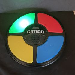 Hasbro Gaming Simon Handheld Electronic Memory Game With Lights and Sounds for Kids Ages 8 and Up 