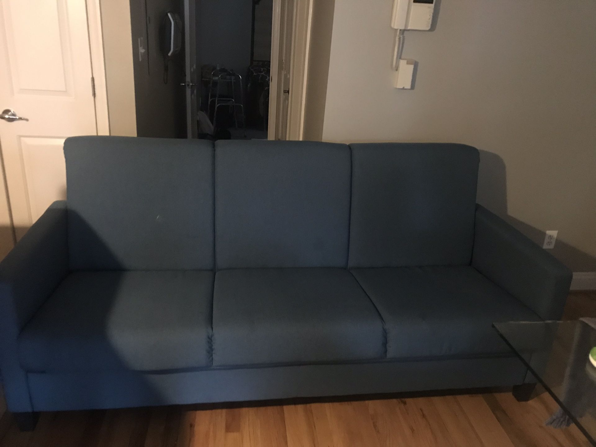 Designer blue modern/contemporary sofa with bed
