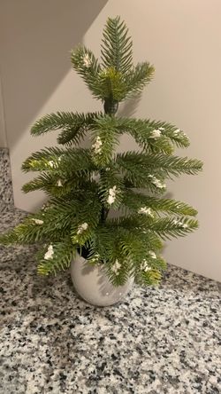 Artificial tabletop potted pine tree with frosted branch