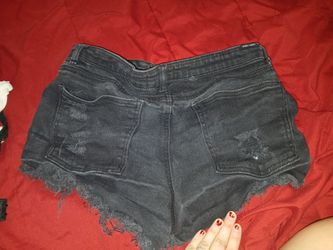 Black distressed shorts