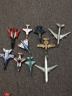Toy jets and a fire truck