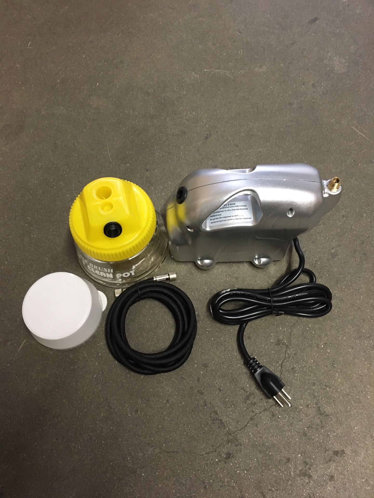 New in box $30 mini airbrush compressor with glass cleaning pot air hose