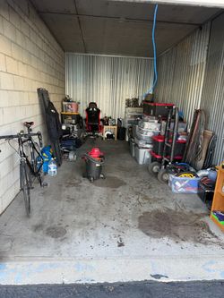 Storage Locker Filled With Motorcycle Parts and Appliance Parts
