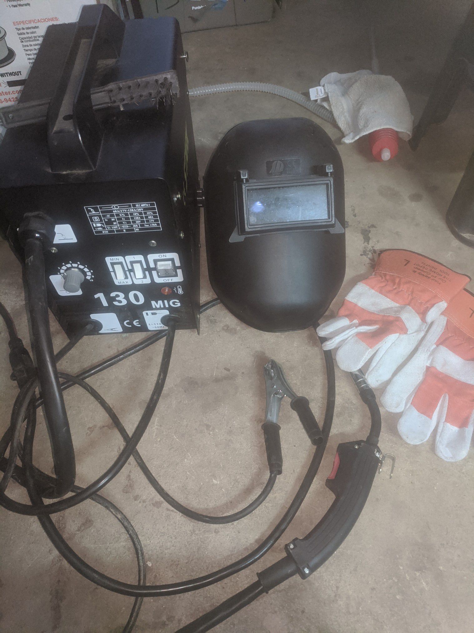 130 MIG welder with mask scraper and gloves