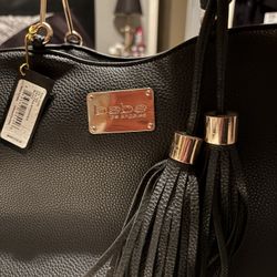 BEBE handbag With Gold Metal Hand Hold