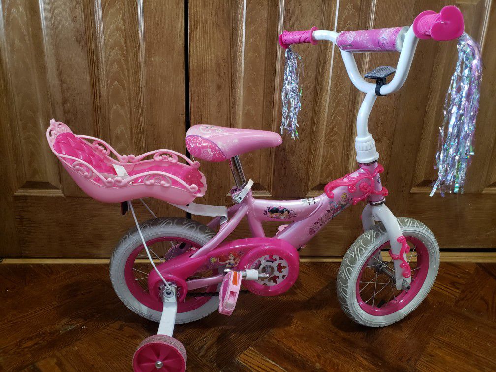Huffy Disney princess bike 12" with doll carrier