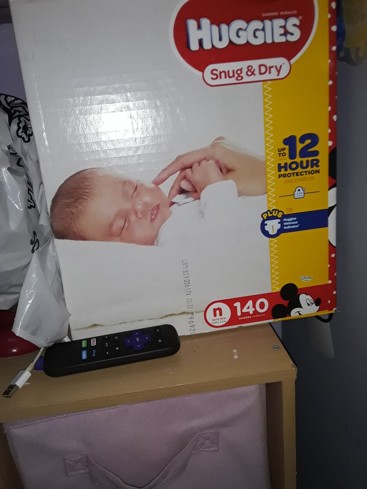 1 unopen box of new born huggies diapers
