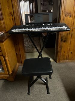 Yamaha EZ-220 keyboard (with lighted keys and power adapter), 61 keys, with stand and bench.
