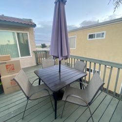 Outdoor Table, 4 Chairs, & Umbrella with Weighted Stand