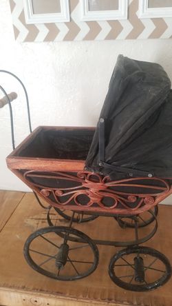 Vintage TOY size stroller 1 &1/2 ft widex 2ft tall. Not including the handle part