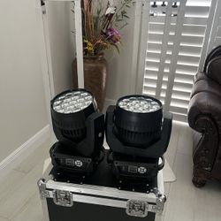 Moving Heads (2) and Adjustable 7ft Truss (2)
