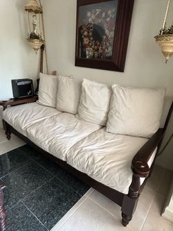 Antique Large, deep sitting couch. Dark wood