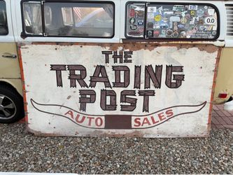 Sign: The Trading Post Auto Sales