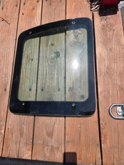 2007 E250 Ford  R H rear doors window
