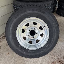New 205-75-14inch trailer tires with galvanized rims.  1920lbs. in stock