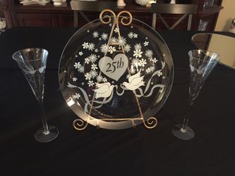 Vintage anniversary plate and crystal etched champagne glasses! I got a 25th anniversary set and a 50th anniversary set! $38 for each set!
