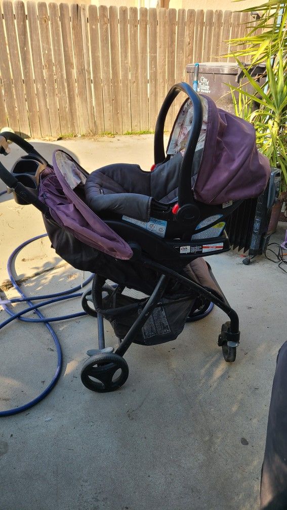 Graco Verb Click Connect Travel System with Snugride Infant Car Seat Pink Black