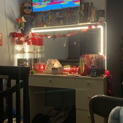 White Vanity With Light Strip In Mirror 