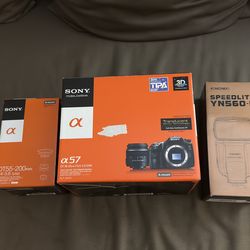 Sony A57 SLT with 55mm & 200mm lenses, Yuongno external flash, remote control, Battery And Charger. 