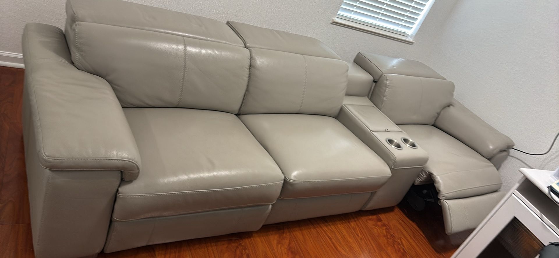 Eldorado furniture, leather couch all three seats recline