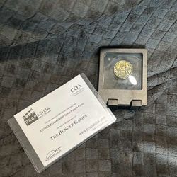 Screen Used Hunger Games Coin