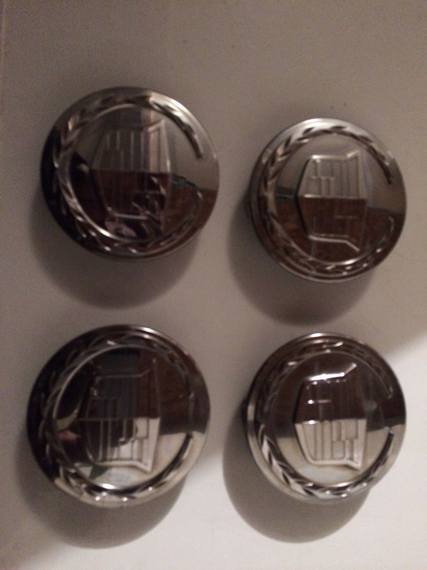 Cadillac center caps 3.2 inches