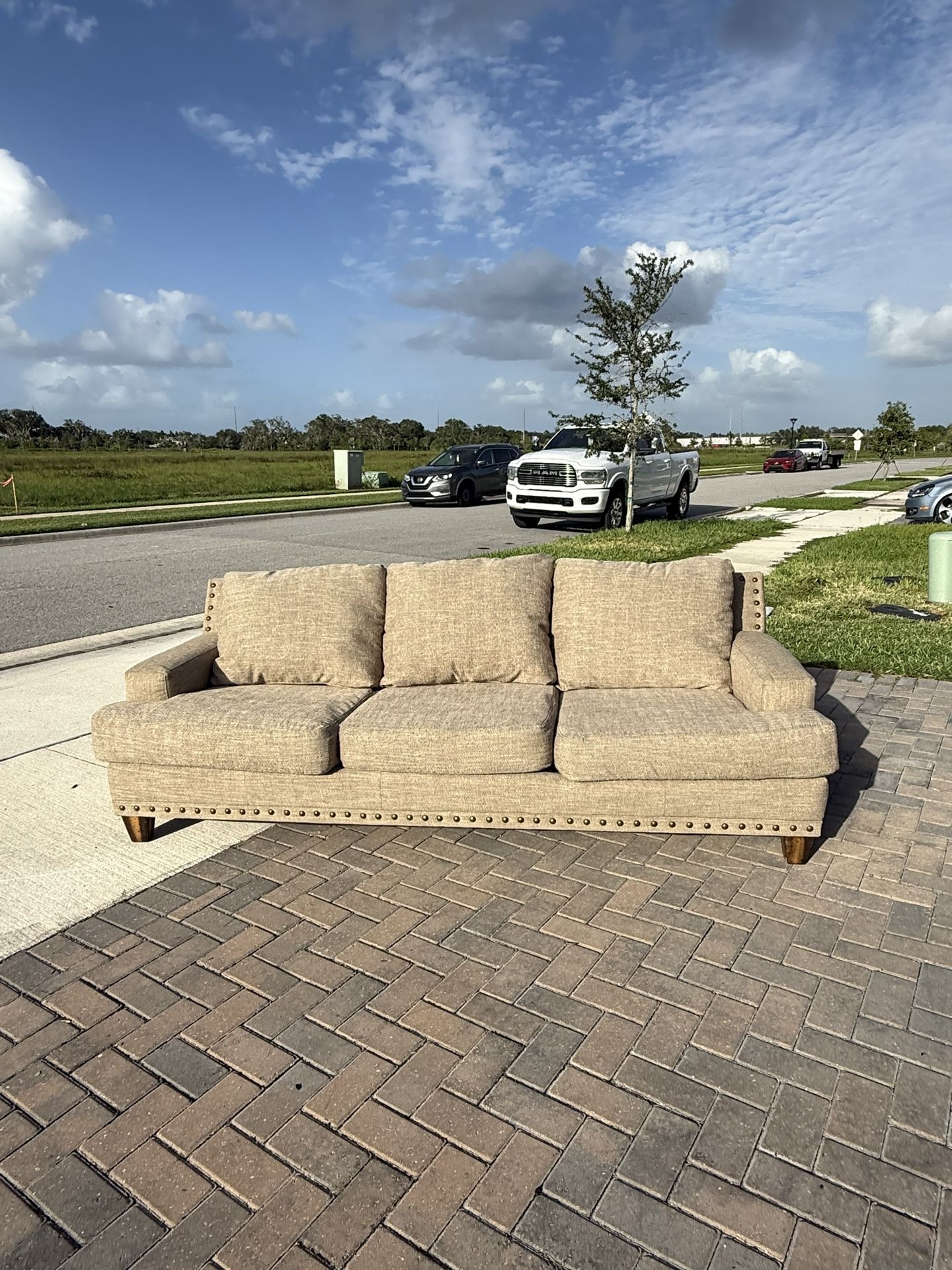 Free speech Delivery- Fabric Couch in Good Condition