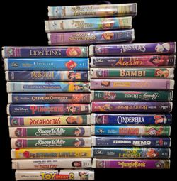 VHS Disney movies + 3 Land Before Time