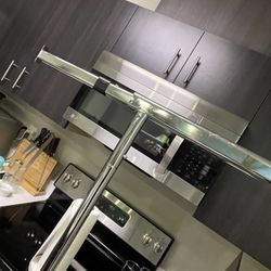 Sturdy Rolling Clothing Rack w/ Adjustable & Extendable Arms – $70