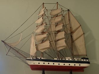 Decorative sail boat and wooden plane