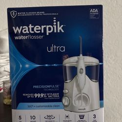 Waterpik Ultra Water Flosser with 10 Settings, 5 Tips, ADA Accepted, White