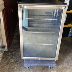 Frigidaire Mini Fridge 138 Can 4.6 Cubic Foot 34 Inch Height 22 Inch Width Stainless Steel Thick Glass Shelf’s Inside is  Brand New 
