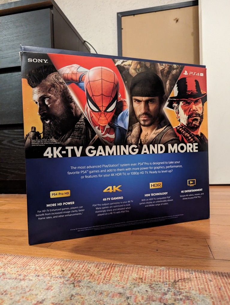 PS4 Pro 1TB In Original Packaging Games Bundle $290