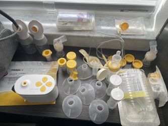 Medella Breast Pump With Special Feeder & Colostrum Collector