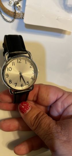 A watch, medium large size pearl dial brown band